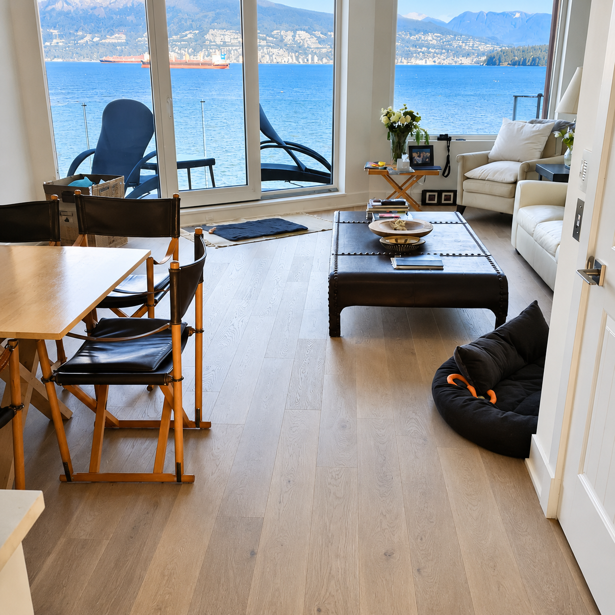 Point Grey Rd Vancouver Home — Mirage white oak wide-plank flooring in living room with English Bay and North Shore mountain views