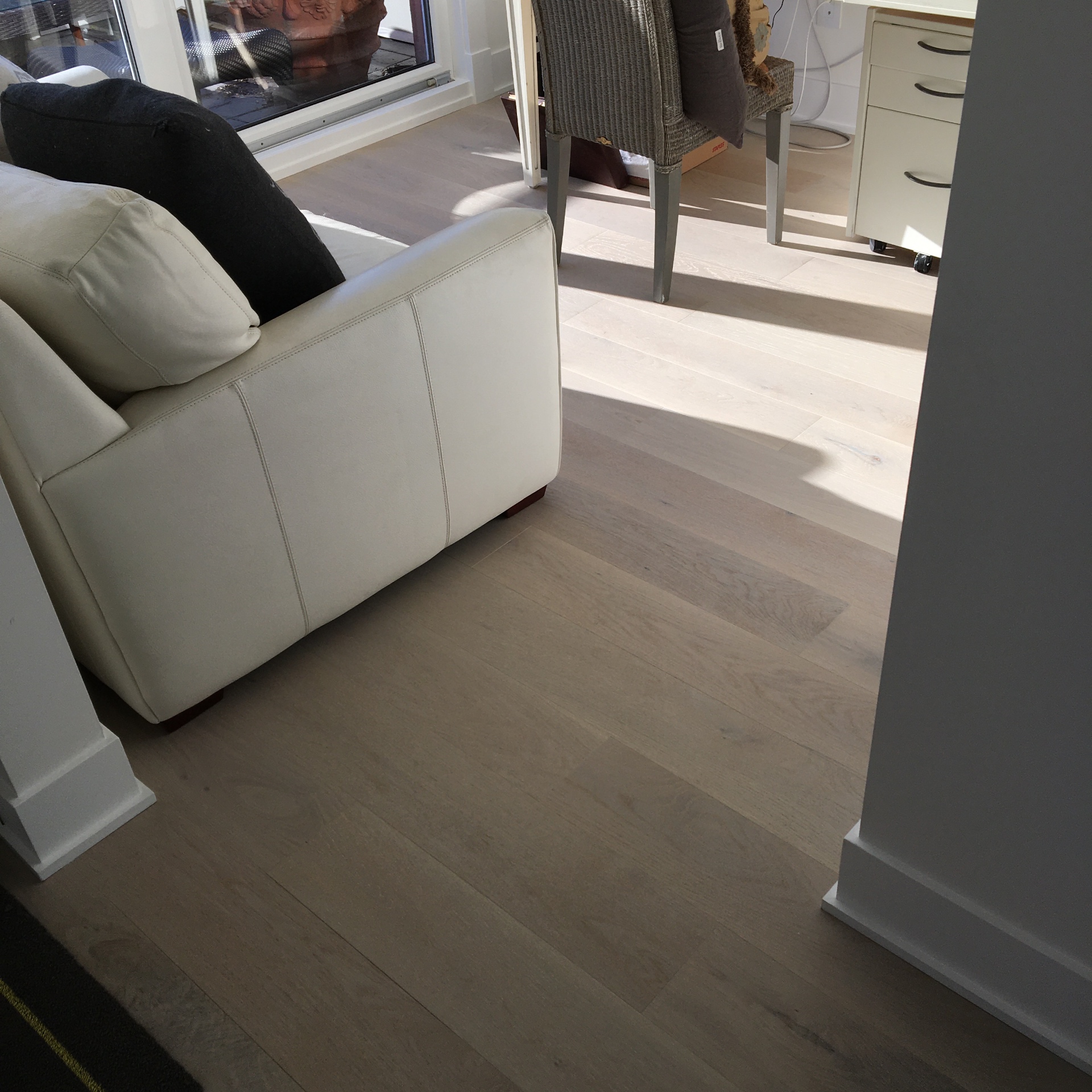 Point Grey Rd Vancouver Home — Mirage white oak wide-plank flooring in sunlit living and dining area