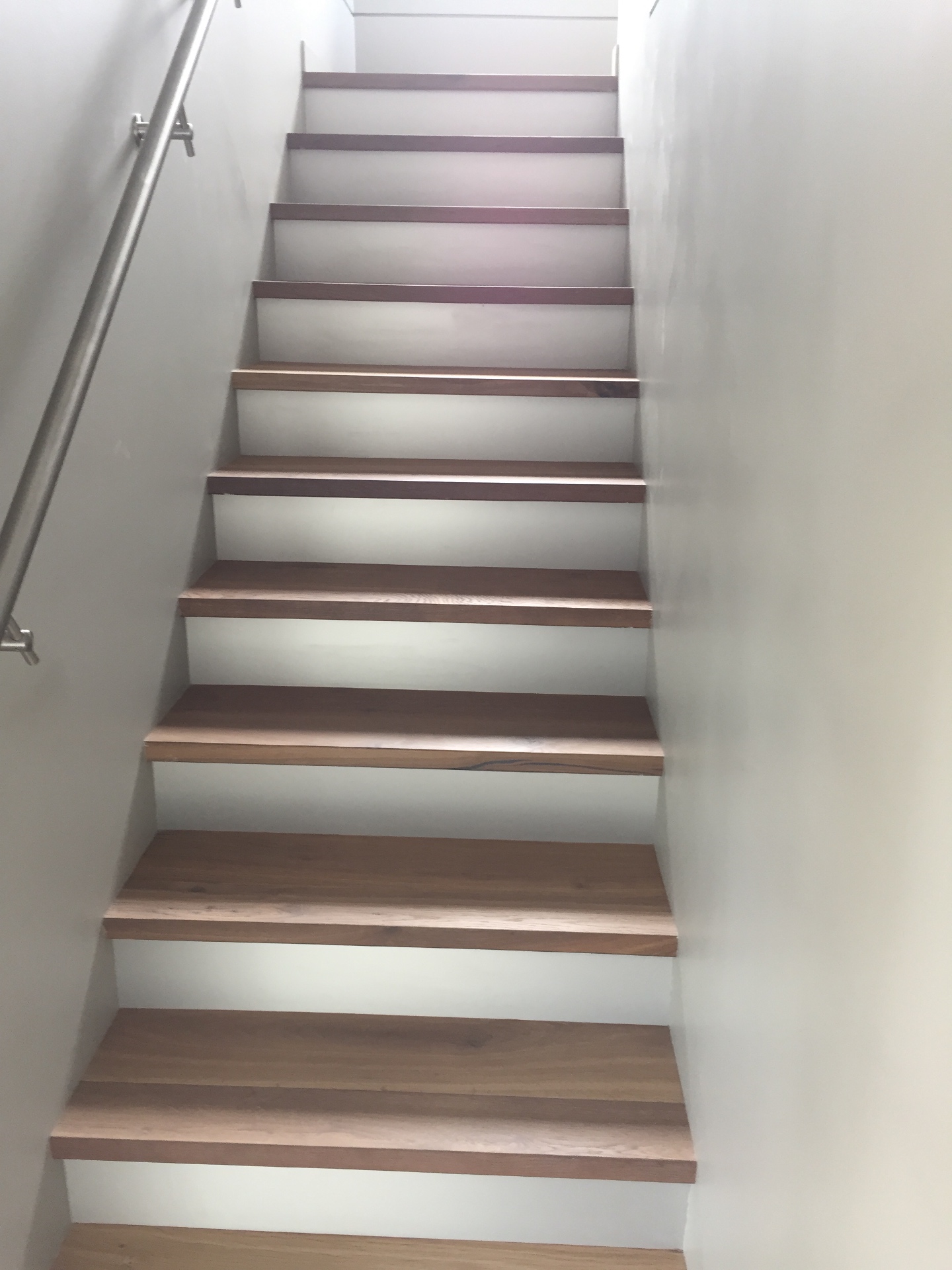 Gibsons House — full straight-run staircase with solid oak treads and white risers